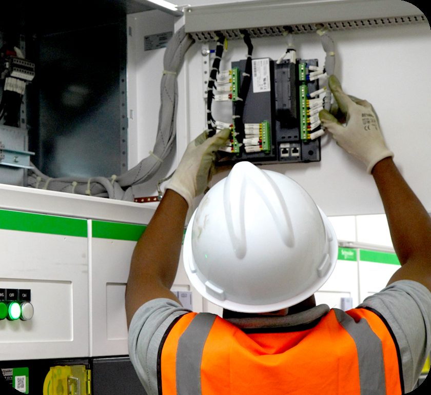 Compass technicians installing electrical infrastructure on site